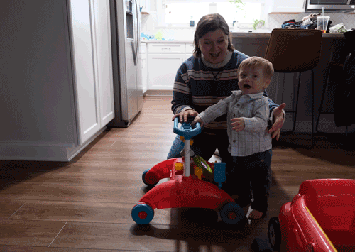 River Masimer, who received EI services,  plays with his toys at his home.